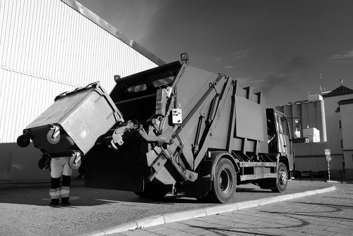 Professionals conducting loft clearance in a Bayswater home