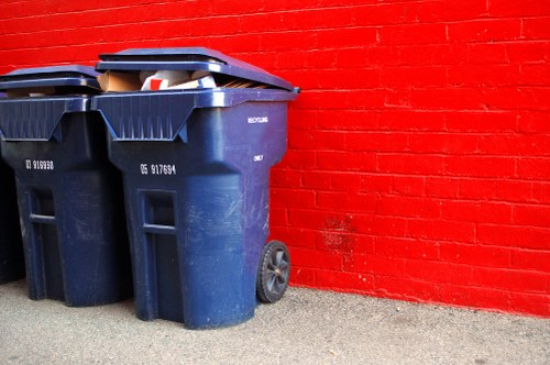 Construction workers managing builders waste clearance in Bayswater