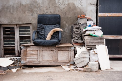 Team removing items during loft clearance in Bayswater